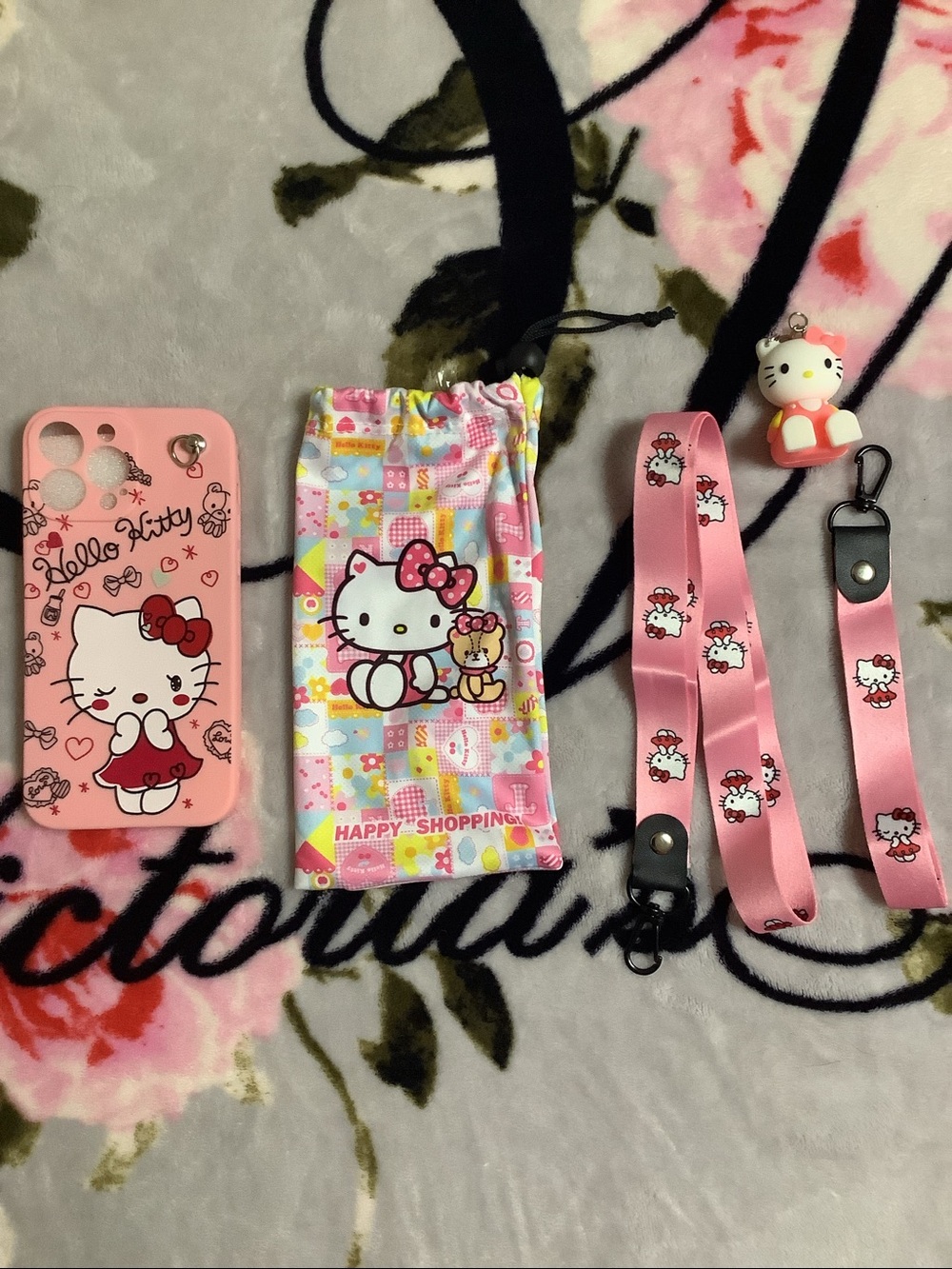 Woman’s Hello Kitty Pink Phone Case, 13 Pro max Pouch, Lanyard & Charm Set
